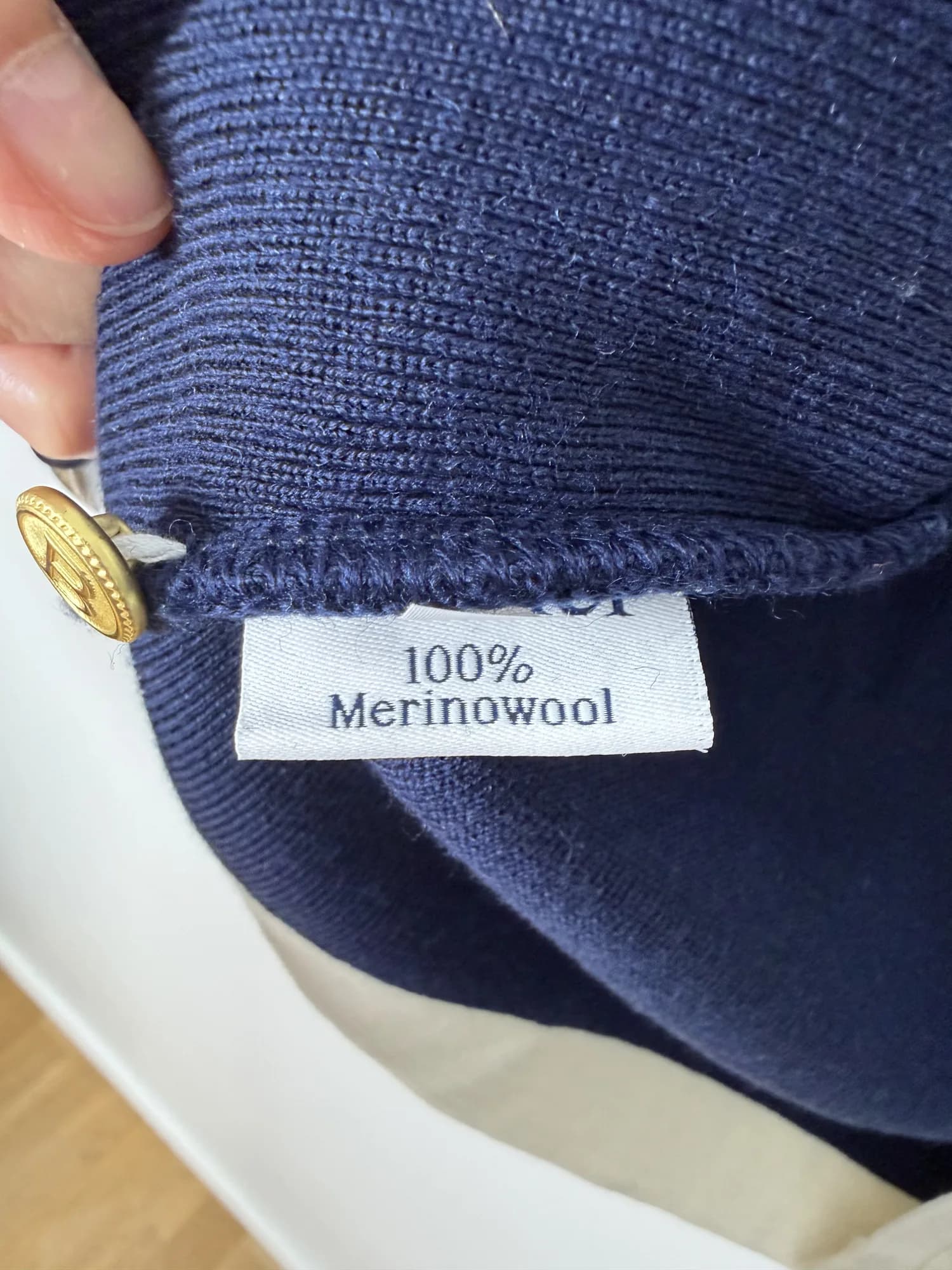Etikett med materialet, 100 % merinoull