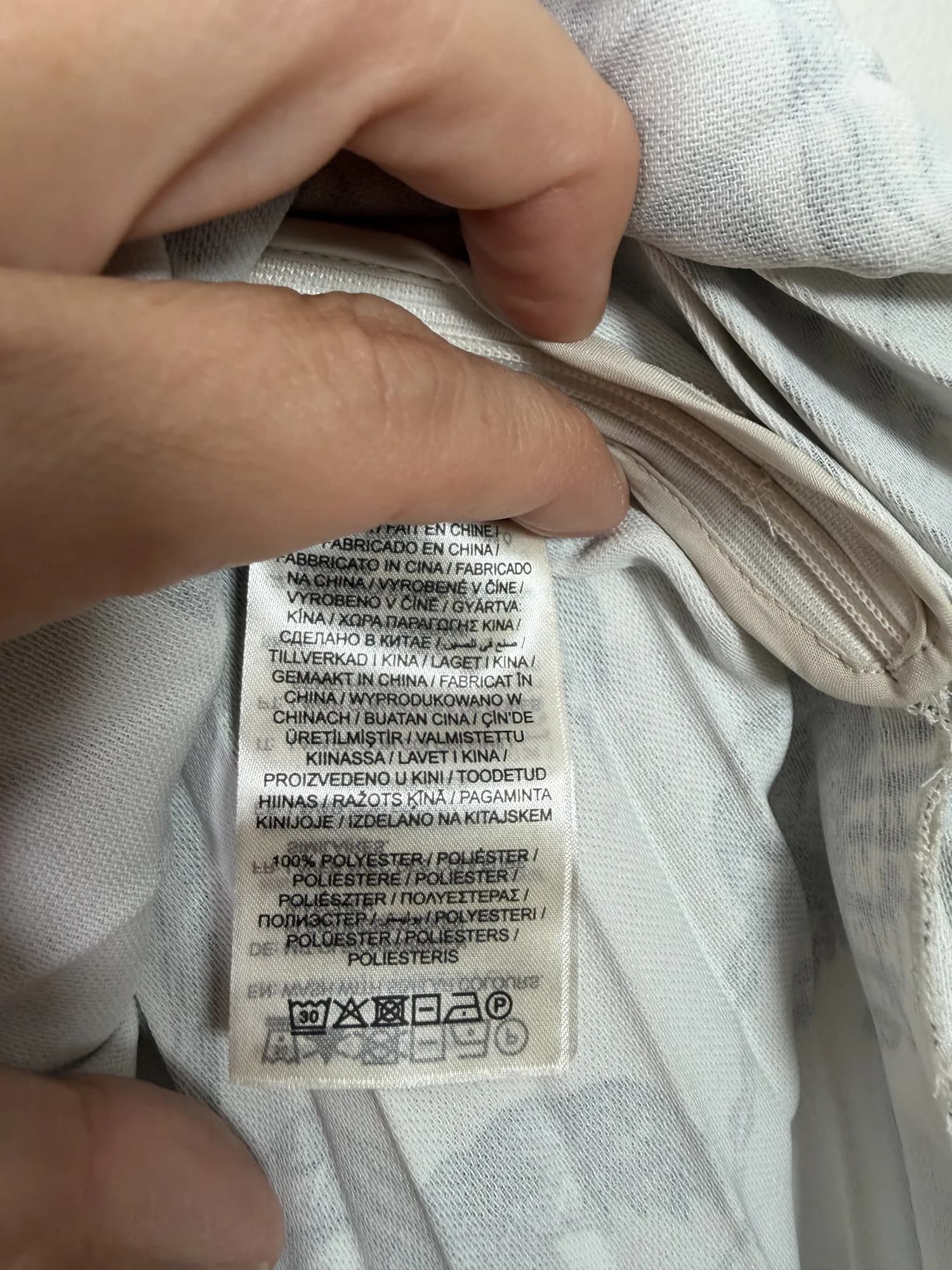 Etikett med materialet, 100 % polyester