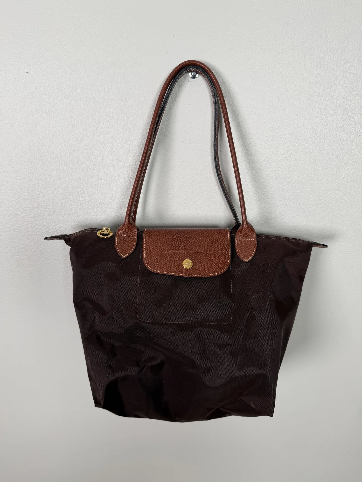 Brun Le Pliage-väska från Longchamp, framifrån