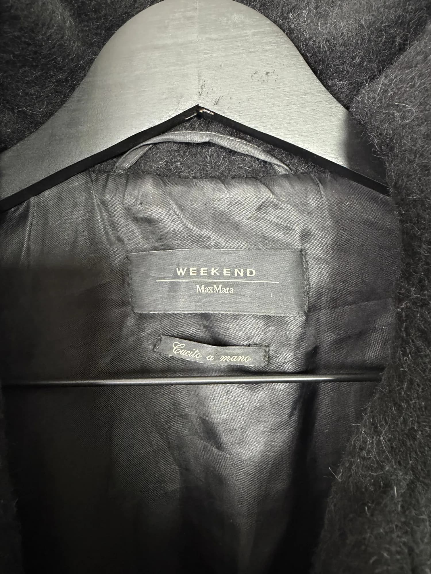 Weekend Max Mara-etiketten och etiketten Cucito a mano