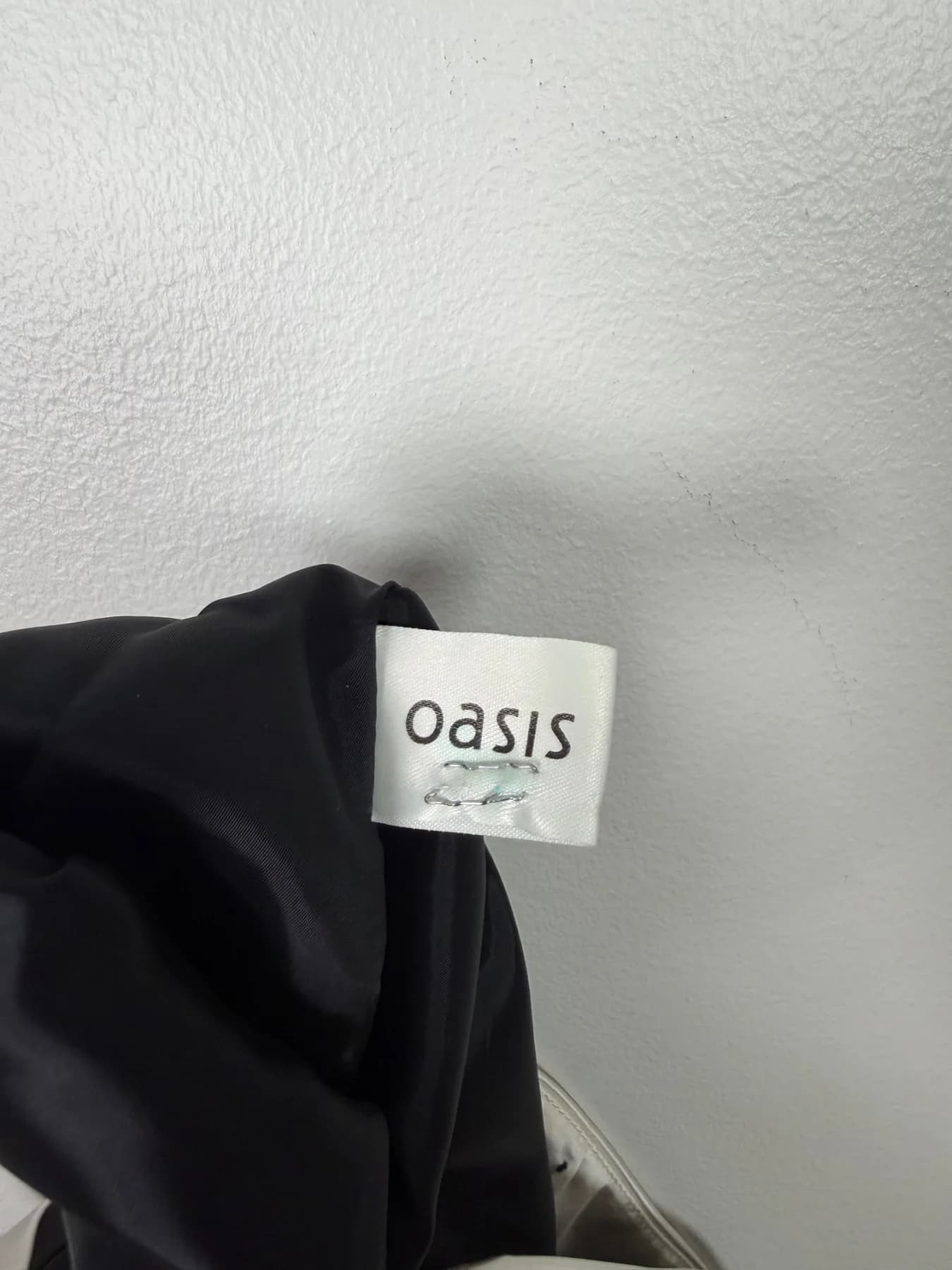 Oasis-etiketten på insidan